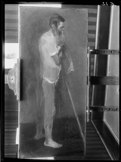 Standing old man with staff