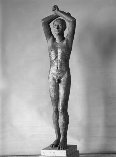 Large standing man with raised arms (Roman man)