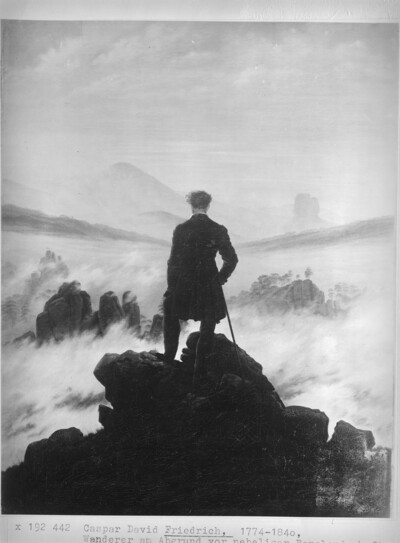 Hikers above the sea of fog