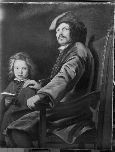 Man in a chair with a boy