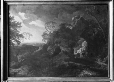 Stormy landscape with fliers under a broken mountain