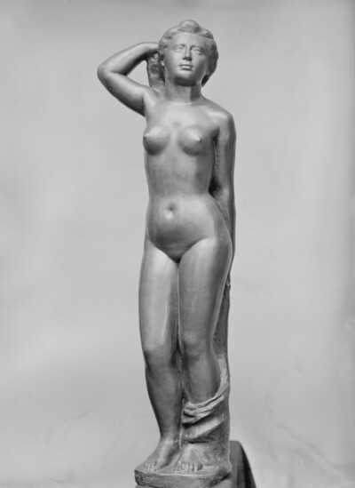 Standing naked female figure