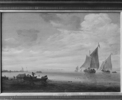 Broad river mouth with barges