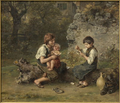 Two boys playing cards