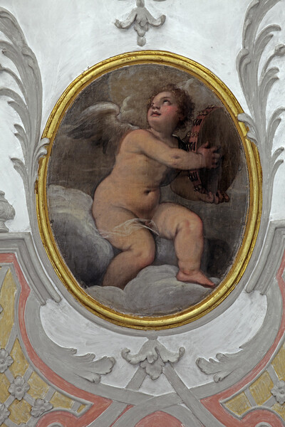 Angel making music