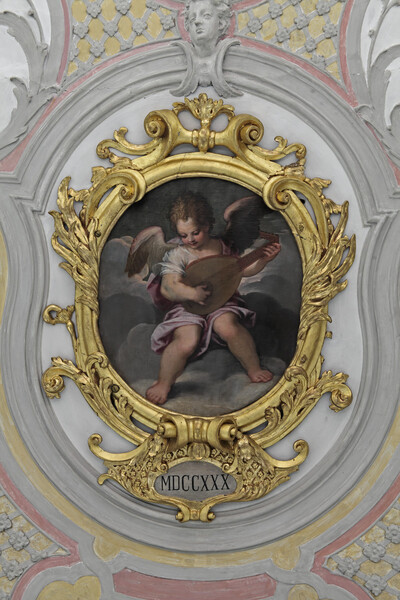 Angel making music