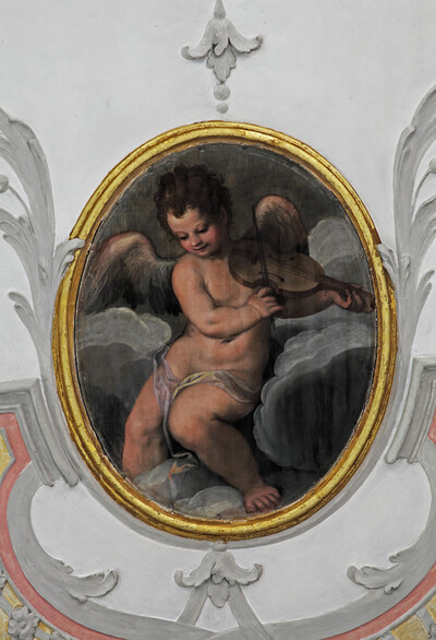 Angel making music