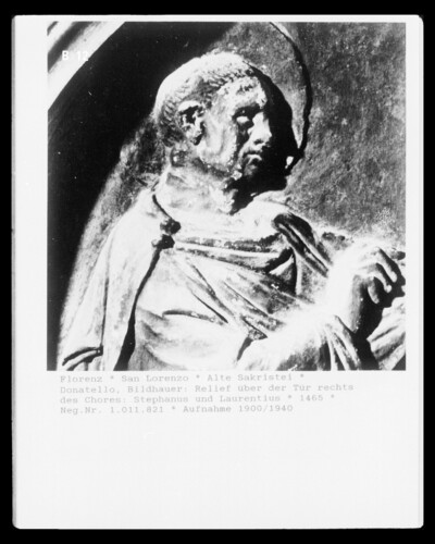 Relief above the door to the right of the choir: Stephanus and Laurentius