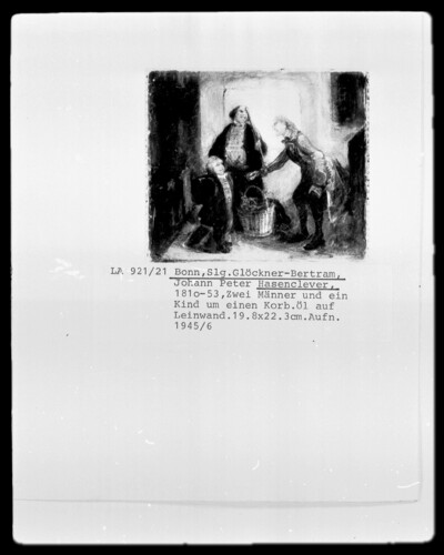 Two men and a child around a basket