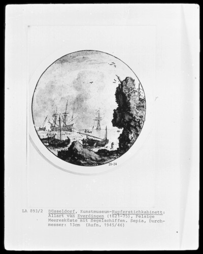 Rocky sea coast with sailing ships