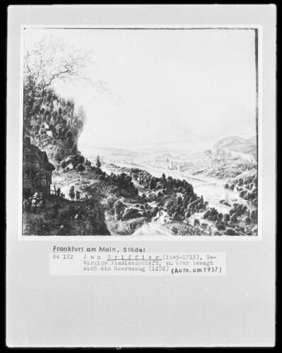 Mountainous river landscape; an army train moves on the shore