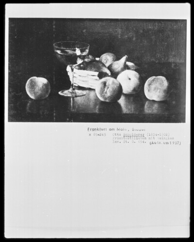 Still life with peaches, a basket of figs and a glass of wine