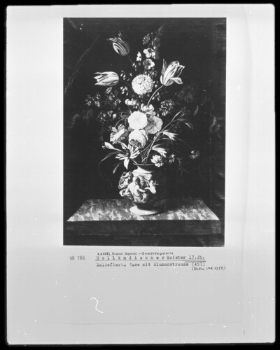 Marble table with relieved vase and flowers