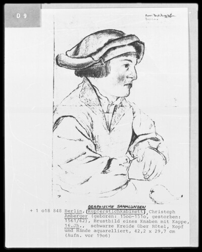 Chest of a boy with a cap