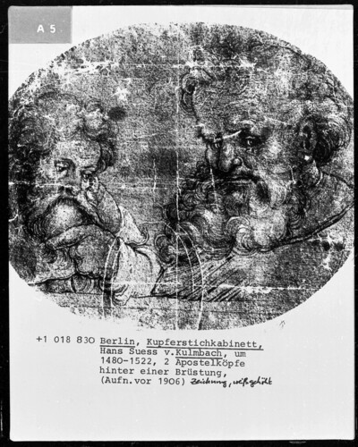 Two apostles behind a parapet