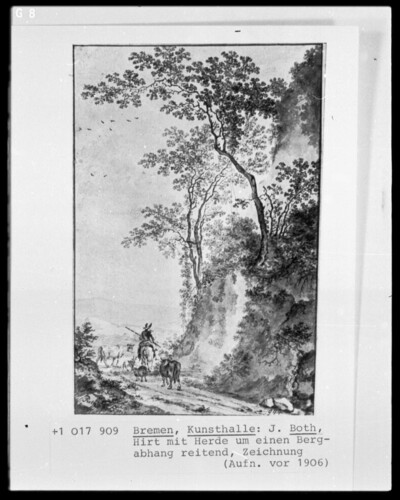 Shepherd riding around a mountain slope