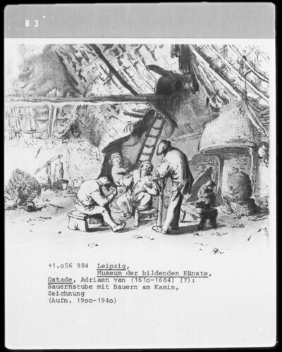 Barn interior with farmers at the fireplace