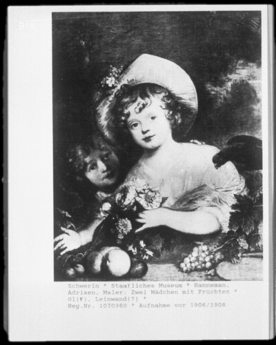 Two girls with flowers and fruits