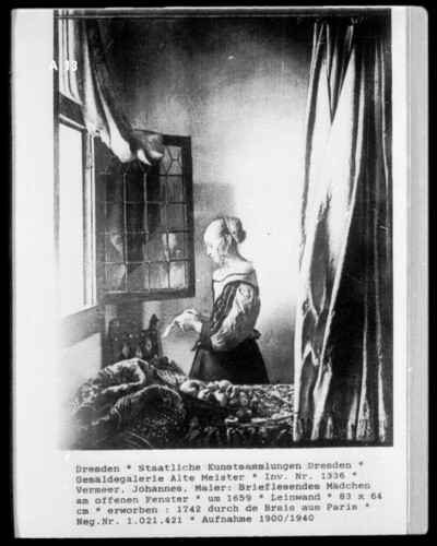 Letter-reading girl at the open window