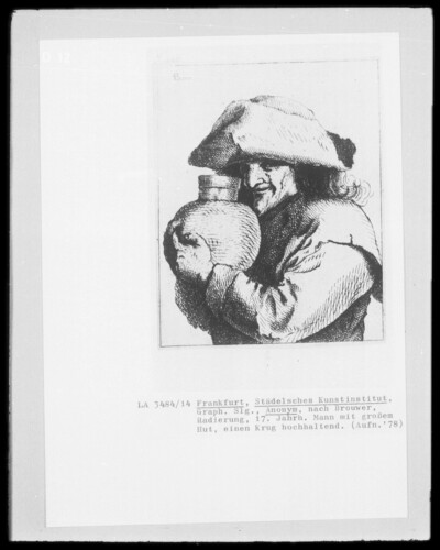Man with big hat, holding a jug