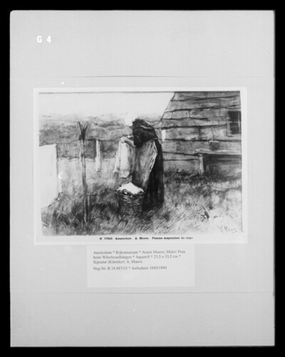 Woman hanging clothes