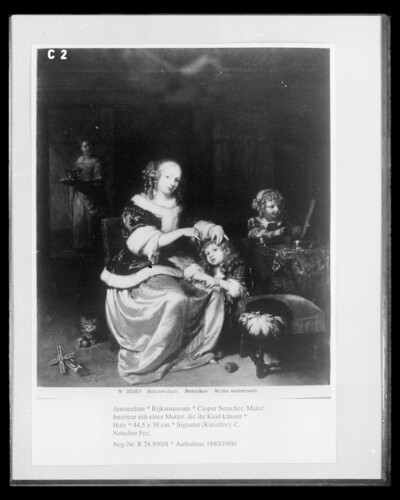 Interior with a mother composing her child