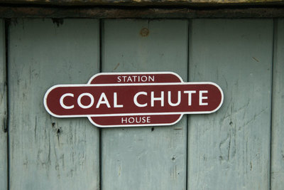 Coal chute sign, Station House, Furness Vale. Looking NW from SK008835.