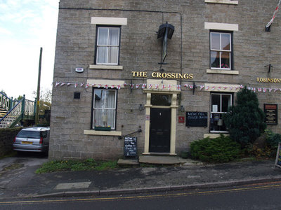 The Crossings pub, Station Road, Furness Vale. Looking SE from SK008835.