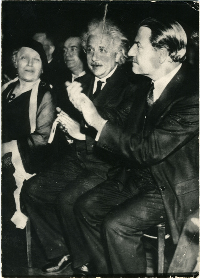 Albert and Elsa Einstein in audience at unknown event with Rabbi ...